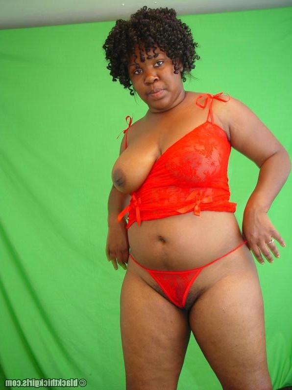 18P Thick ass black girl undressing in the bedroom