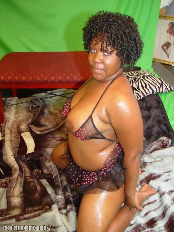 18P Thick ass black girl undressing in the bedroom
