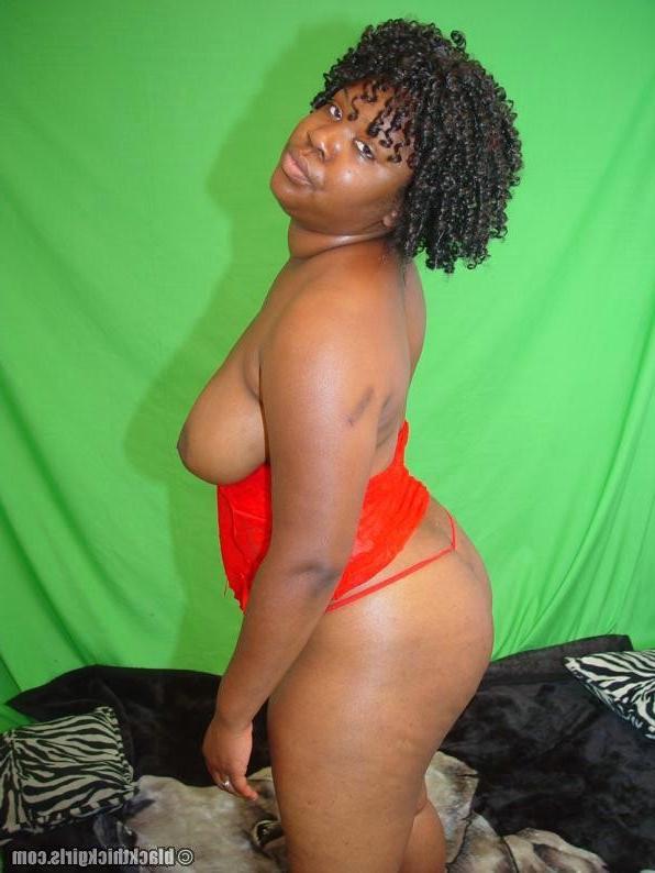 18P Thick ass black girl undressing in the bedroom