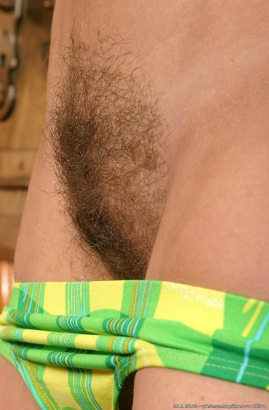 15P Hairy ass Kitty peels off her bikini and spreads her ass cheeks