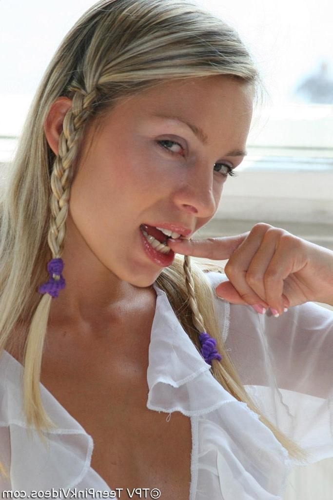 15P Blonde teen in pigtails stripping by the window