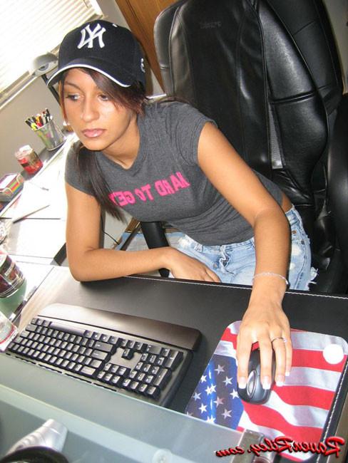 16P Naughty girl with tight ass sits in office chair