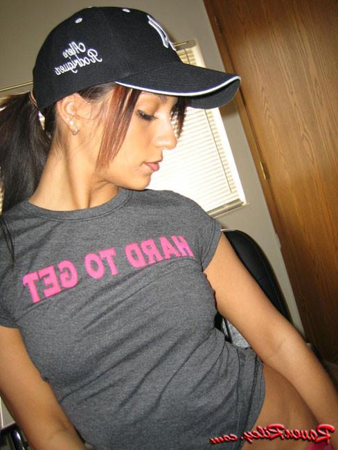 16P Naughty girl with tight ass sits in office chair