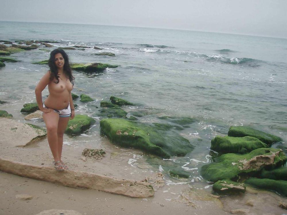 25P ARAB GIRL ON BEACH