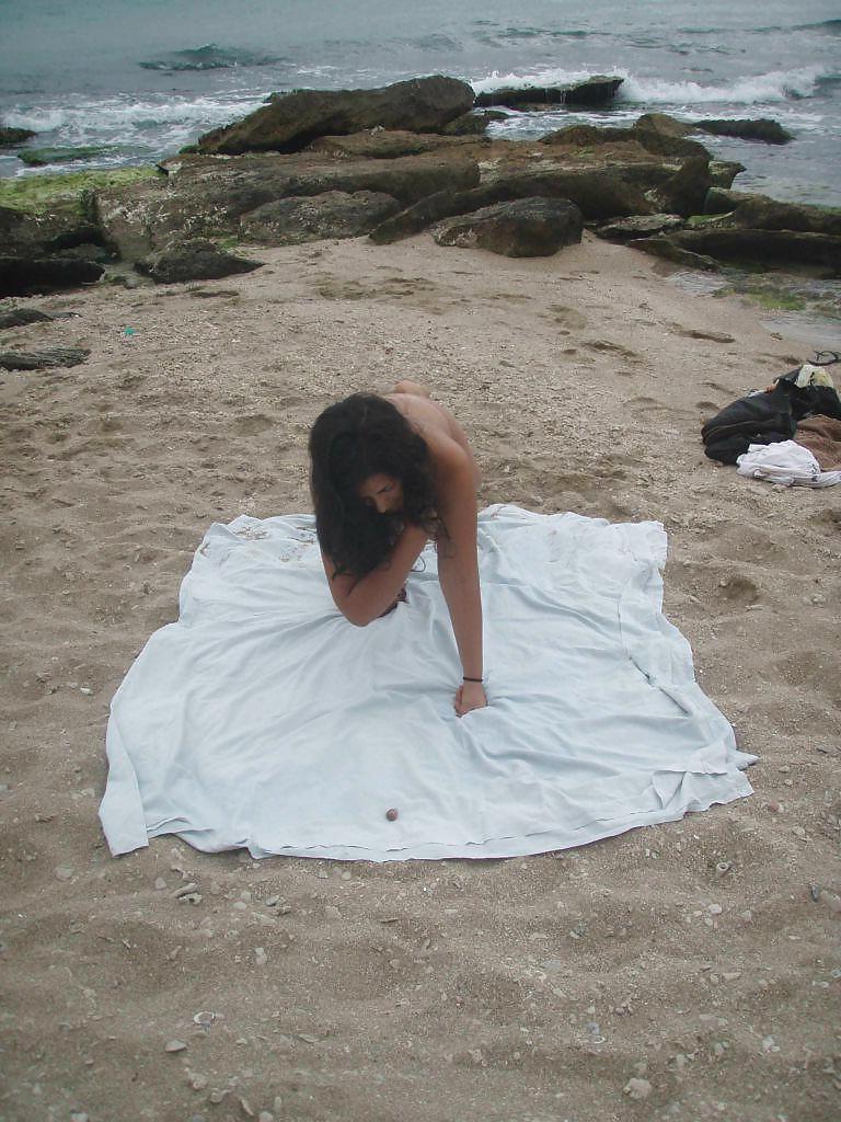 25P ARAB GIRL ON BEACH