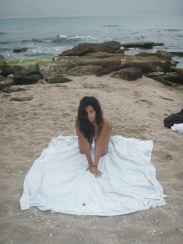 25P ARAB GIRL ON BEACH