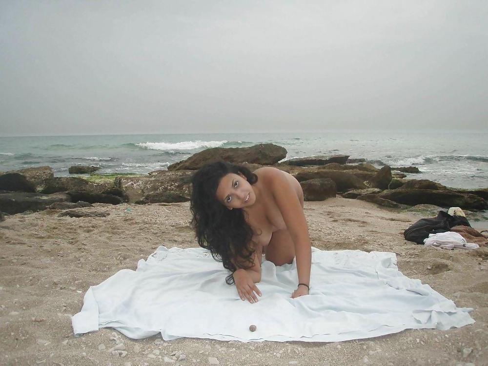 25P ARAB GIRL ON BEACH