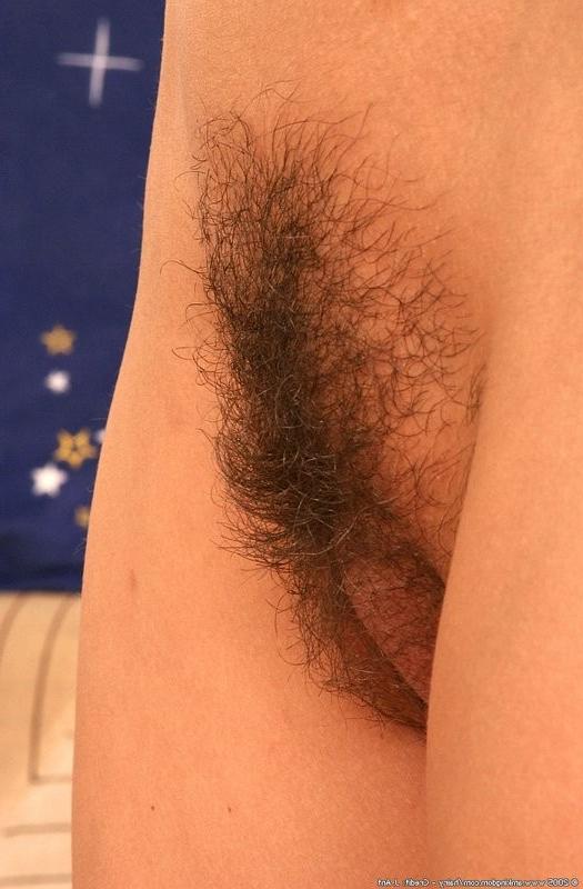 15P Natural and hairy girl Elena shows off her incredible body