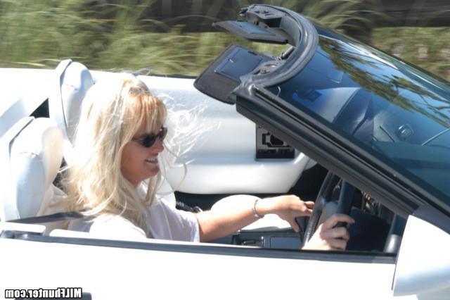 15P Hot blonde milf gives a blowjob in her convertible then gets fucked at home