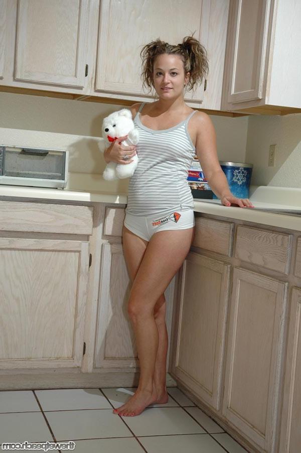 16P Smoking hot college girl pulling her tits out in the kitchen!