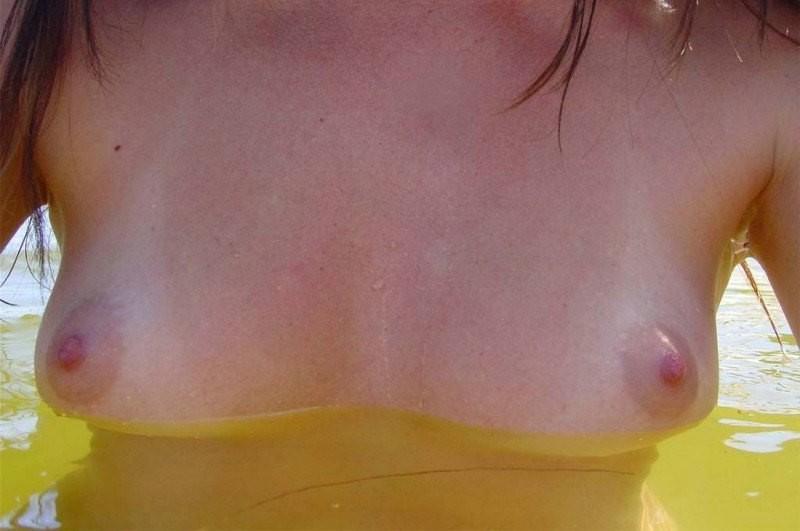 15P Gorgeous blonde teen with nice tits posing on camera naked