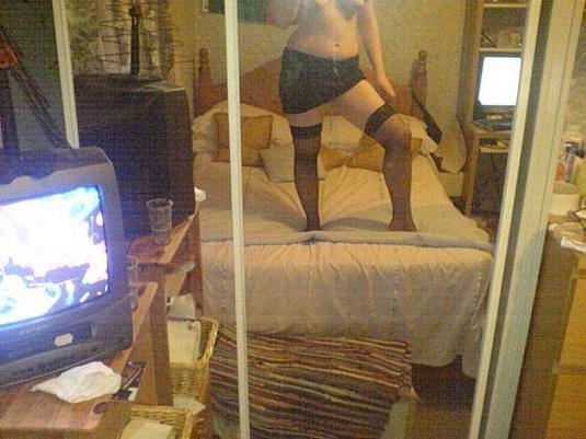 15P Gorgeous blonde teen with nice tits posing on camera naked