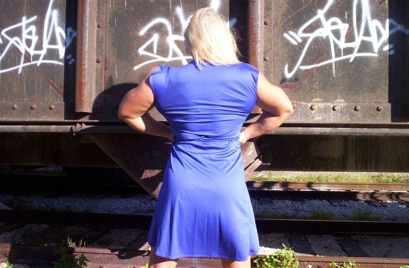 12P Massive blonde female bodybuilder posing sexy