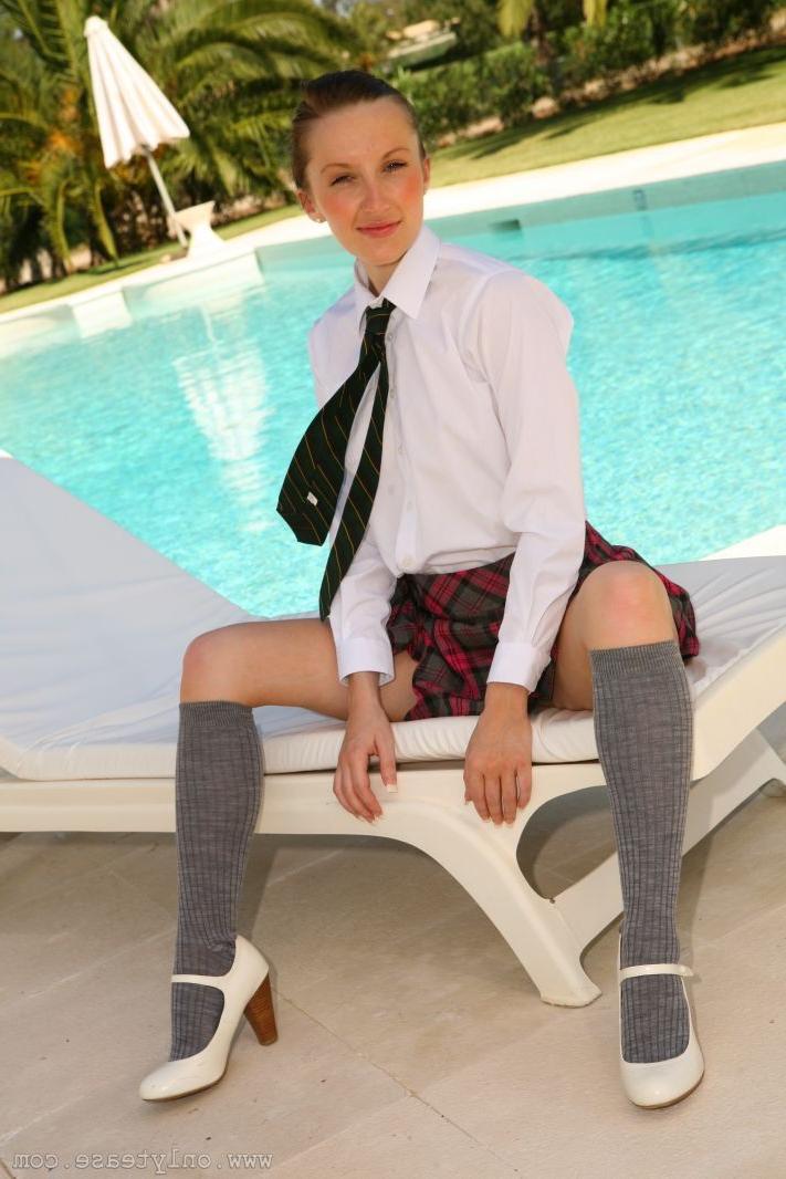 16P Lovely Sophia Smith dressed as a sexy college girl by the pool.