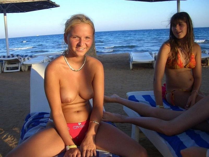 15P Gorgeous blonde teen with small tits posing on camera naked