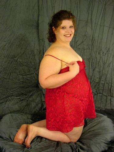 16P Huge woman takes off her satin red lingerie and poses nude
