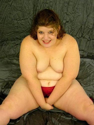 16P Huge woman takes off her satin red lingerie and poses nude