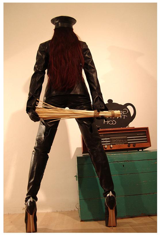 15P A strict gestapo mistress in leather and ultra high heels