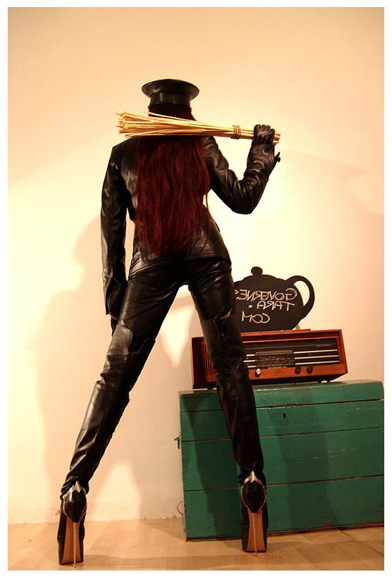 15P A strict gestapo mistress in leather and ultra high heels