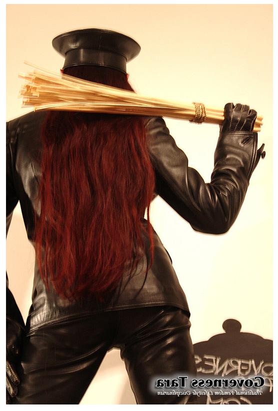 15P A strict gestapo mistress in leather and ultra high heels