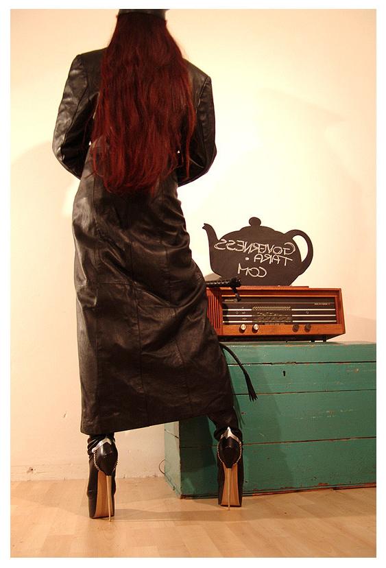 15P A strict gestapo mistress in leather and ultra high heels