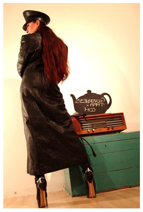 15P A strict gestapo mistress in leather and ultra high heels