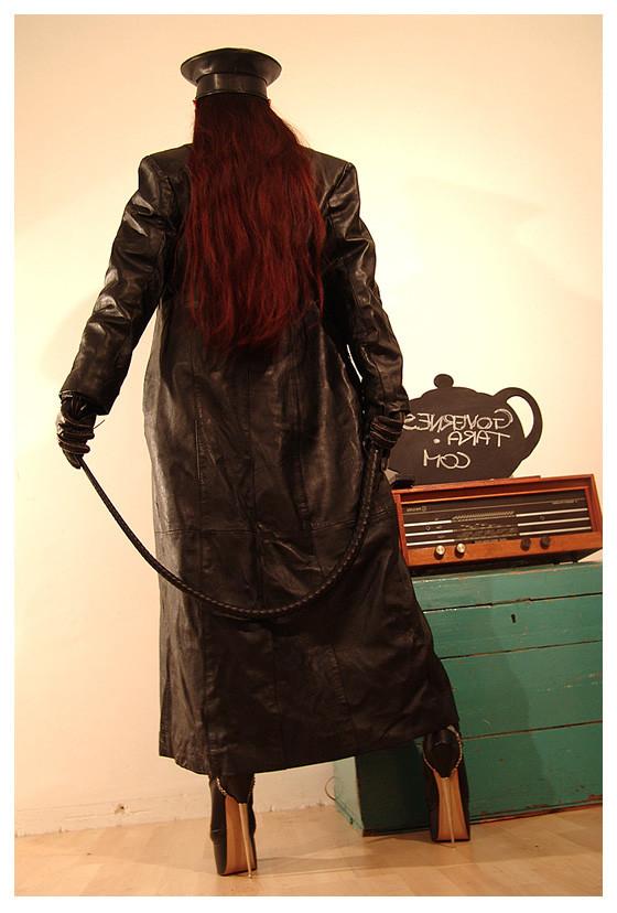 15P A strict gestapo mistress in leather and ultra high heels