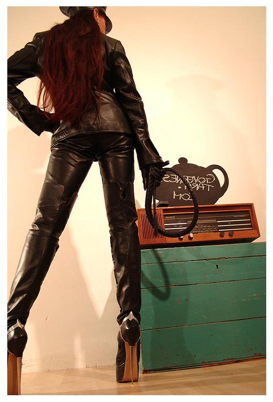 15P A strict gestapo mistress in leather and ultra high heels