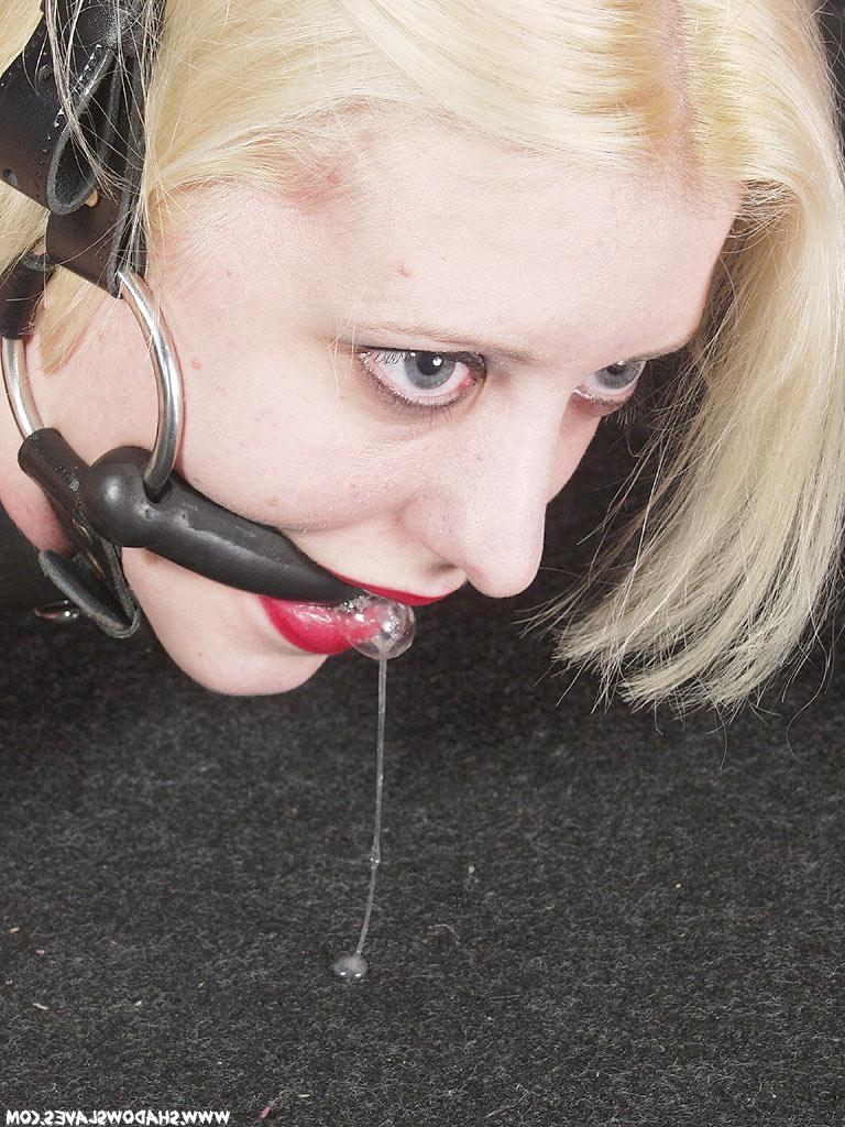15P Blonde slave in leather bondage