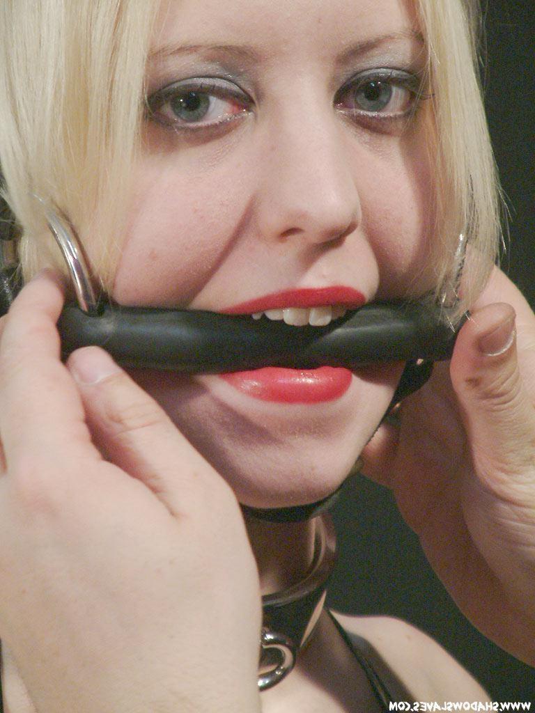 15P Blonde slave in leather bondage