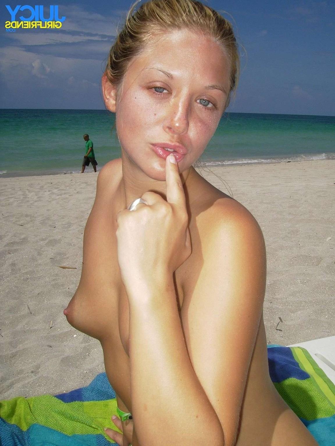 10P Beautiful young GF shows her tits on public beach