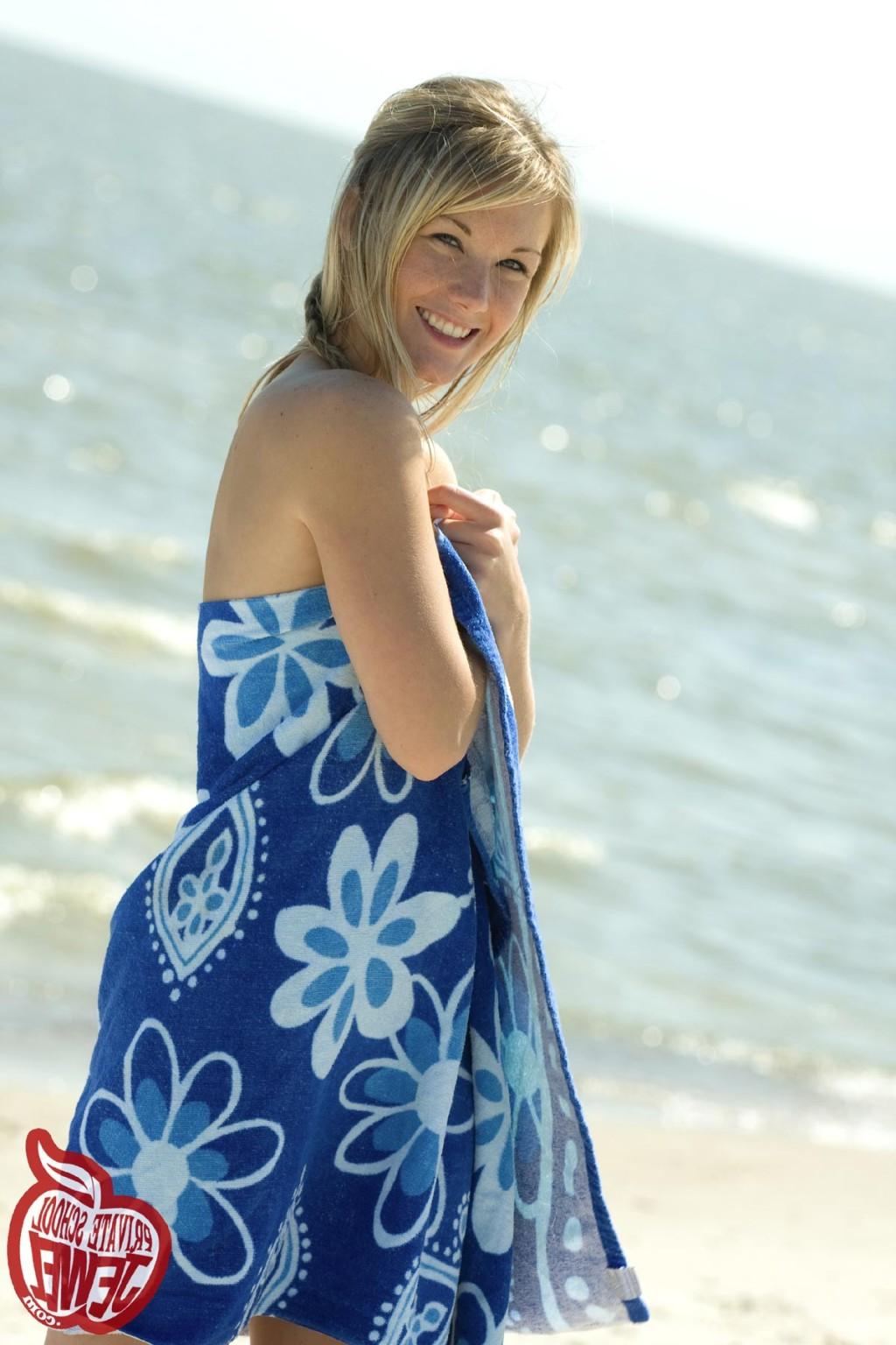 16P Cute blonde teen girl at beach