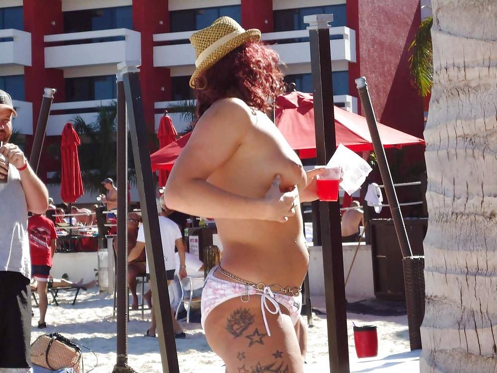 15P Sexy naked teen girls play together at a public beach
