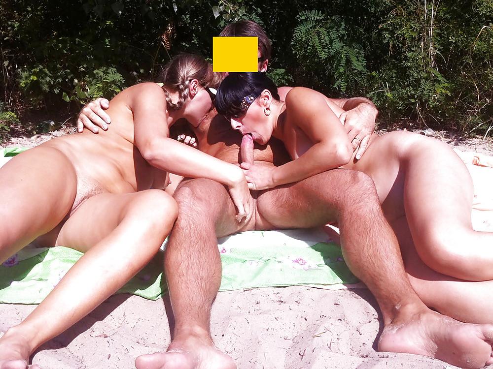 15P Naked beach couple having oral and doggystyle sex