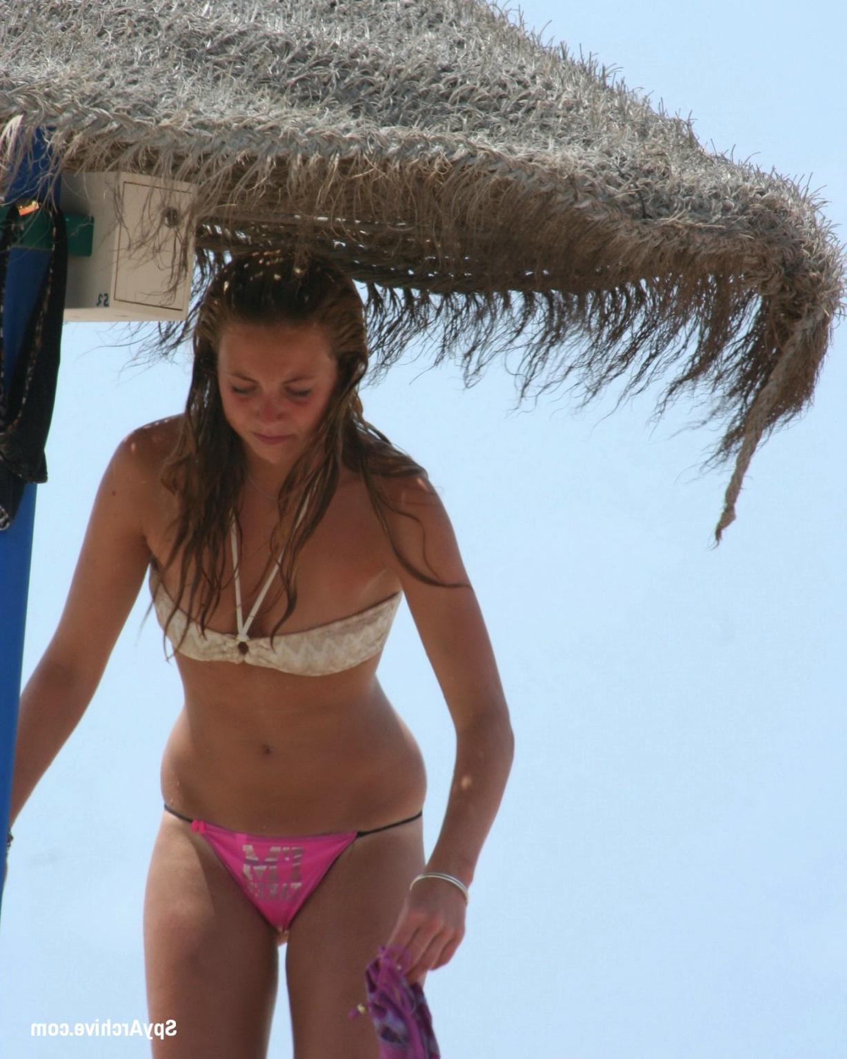 15P Real voyeur pictures of hot blonde taking off her clothes