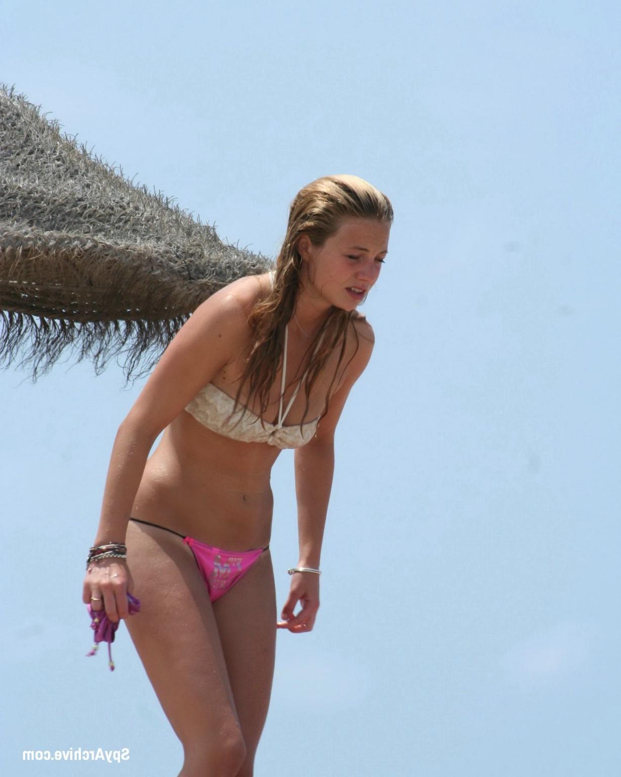 15P Real voyeur pictures of hot blonde taking off her clothes
