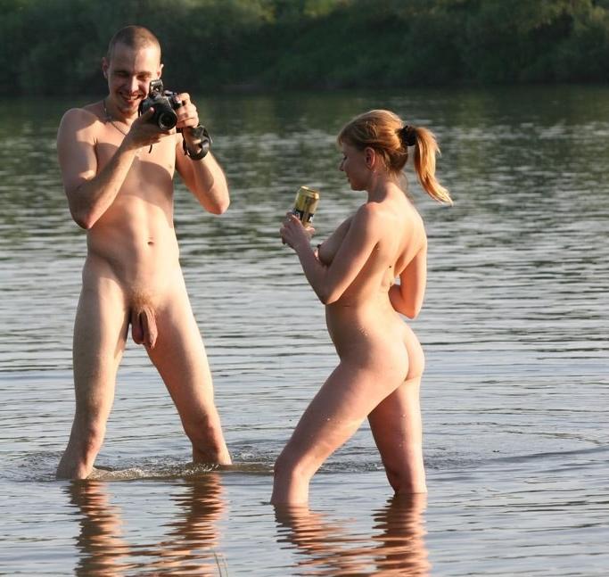 15P Long haired brunette shows her goods at the beach