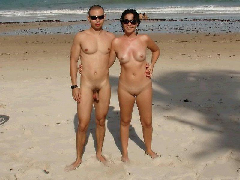 15P Two amateur nudists frolic around the beach