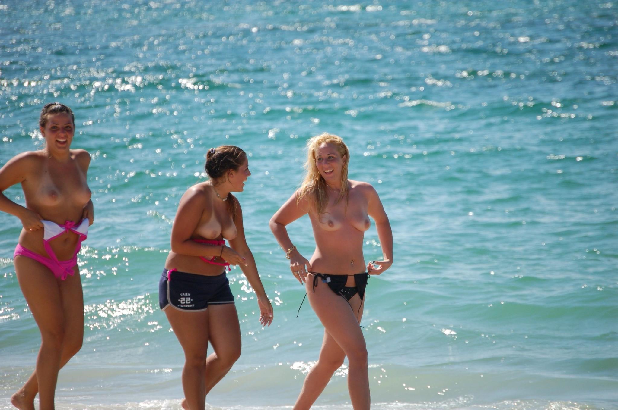 15P Hot nudist babes make this nude beach even hotter