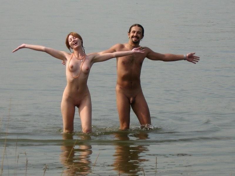15P Beach nudists caught sunbathing nude in the rocks