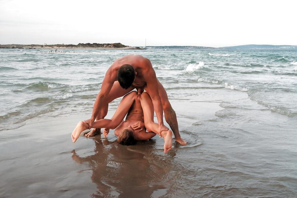 15P Nude beach bunny sucking two cocks in a threesome
