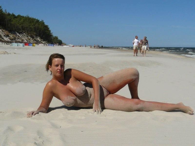 15P Slim teen with big boobs naked at a nudist beach