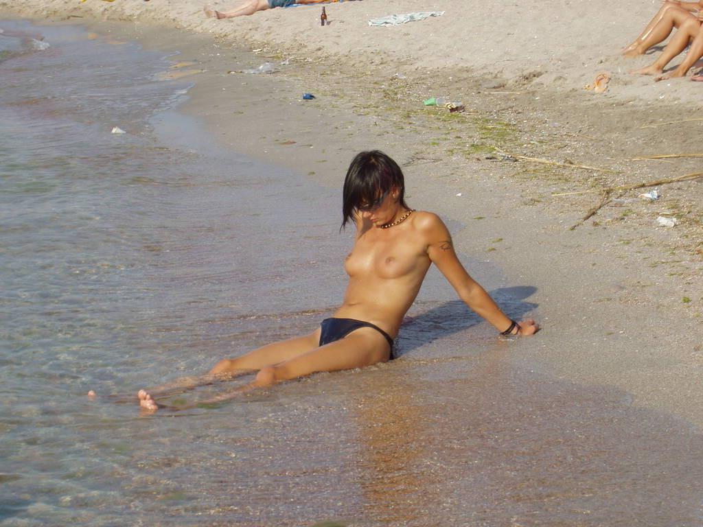 15P Slim teen with big boobs naked at a nudist beach
