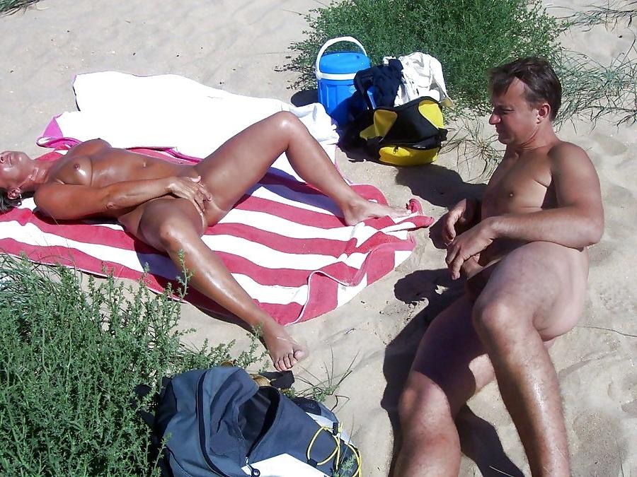15P Real amateur couple having hot beach sex
