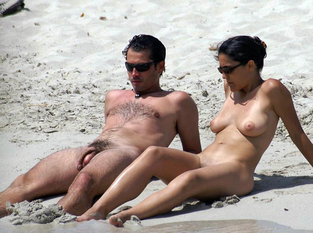 15P A pair of nudists steam up the beach