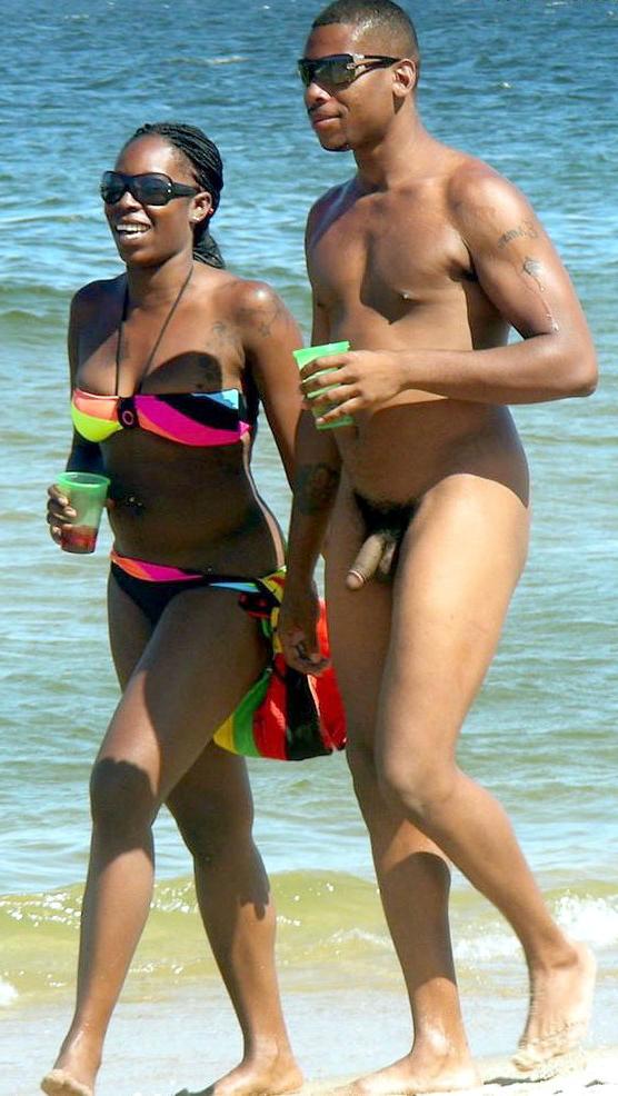 15P Blonde nudist strips down naked at a public beach