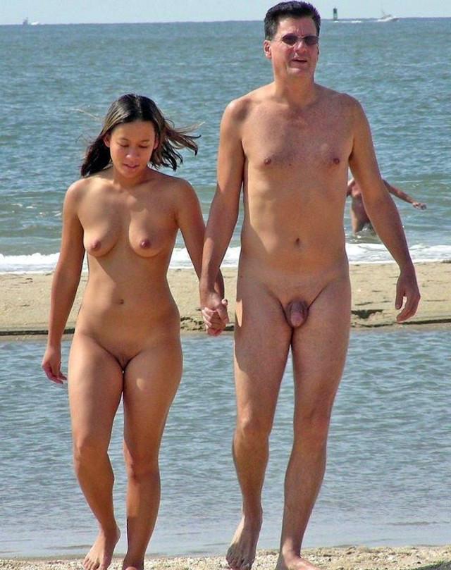 15P Nude friends play around at a public beach