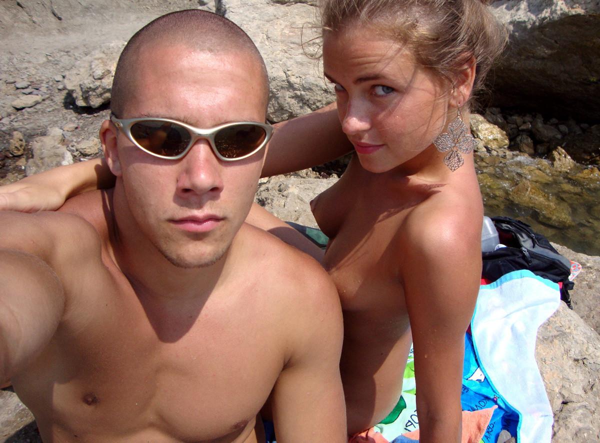 15P Nude teen friends play around at a public beach
