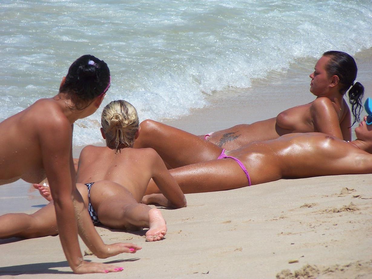 15P Naked friends play around at a public beach