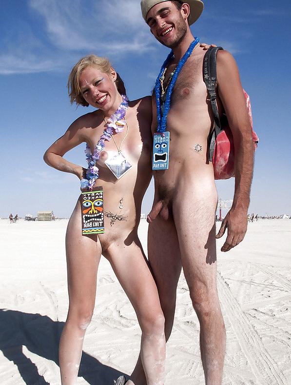 15P Busty girl shows her naked body at the nude beach